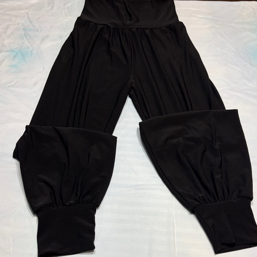 Black Genie Leg Pants With Slits on each side.